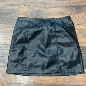 Black leather skirt, size 10, zip up.